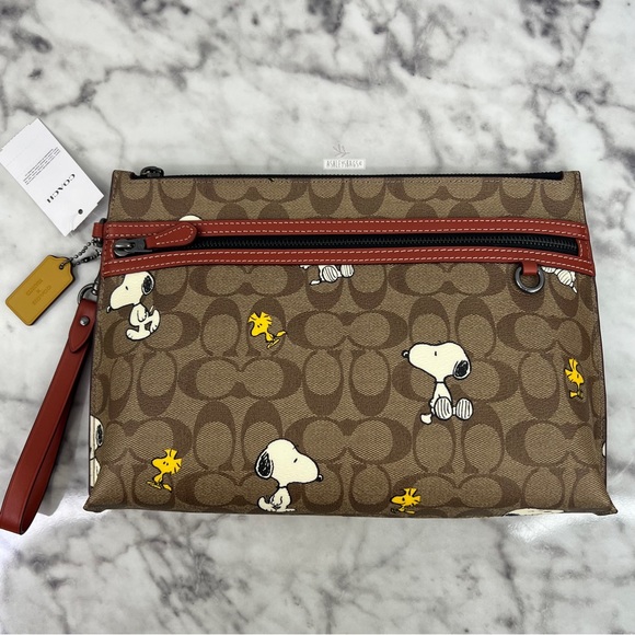 Coach Handbags - Coach X Peanuts Carry All Pouch In Signature Canvas With Snoopy Woodstock Print